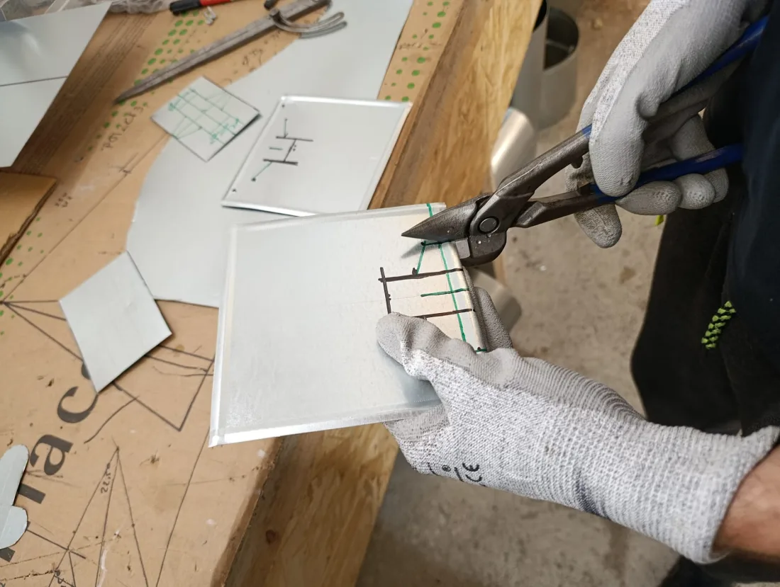 Cutting sheet metal during workshop practice